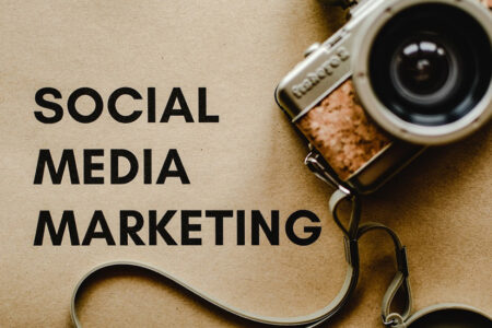 The picture shows the camera and social media marketing written in the picture social media marketing agency
